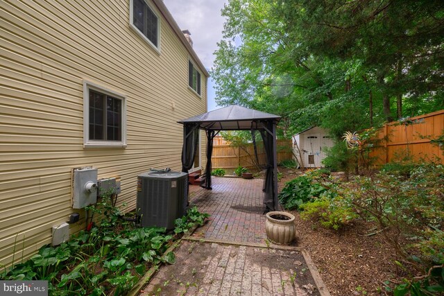 9416 Mirror Pond Dr, Fairfax, VA 22032 - fenced backyard featuring a gazebo, a patio, and a shed