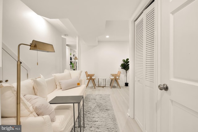 living room with light hardwood / wood-style flooring