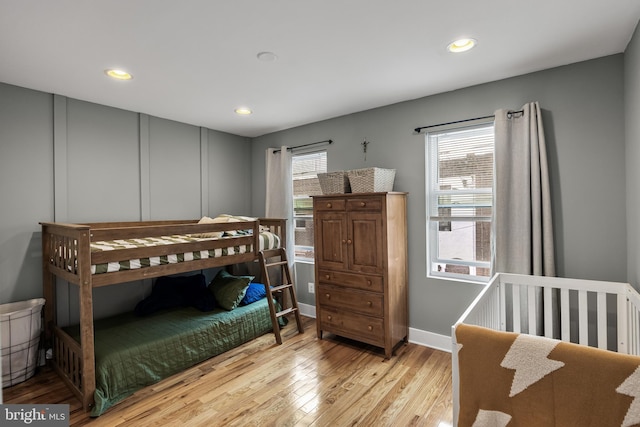 bedroom with light wood-type flooring