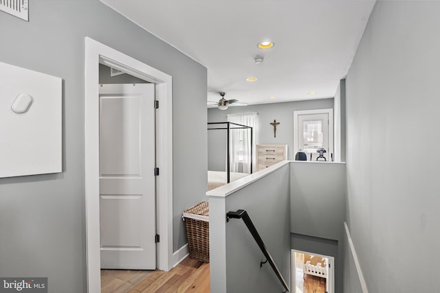 corridor featuring light hardwood / wood-style flooring