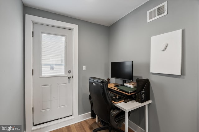 office area with hardwood / wood-style flooring