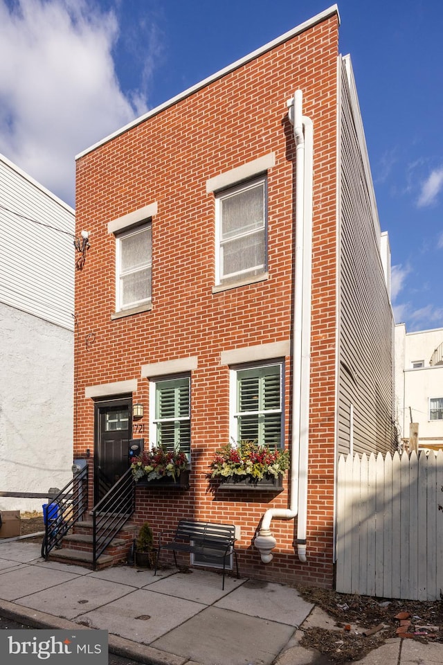 view of front of home with a patio area