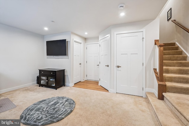 living area with carpet