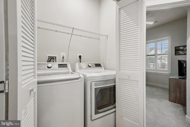 washroom with light carpet and washing machine and dryer