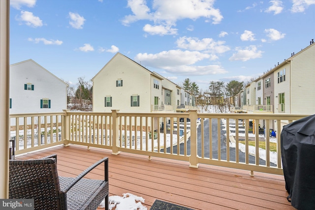 wooden deck featuring grilling area