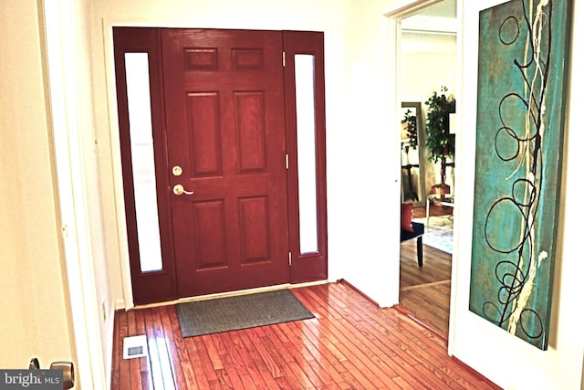 foyer featuring hardwood / wood-style floors