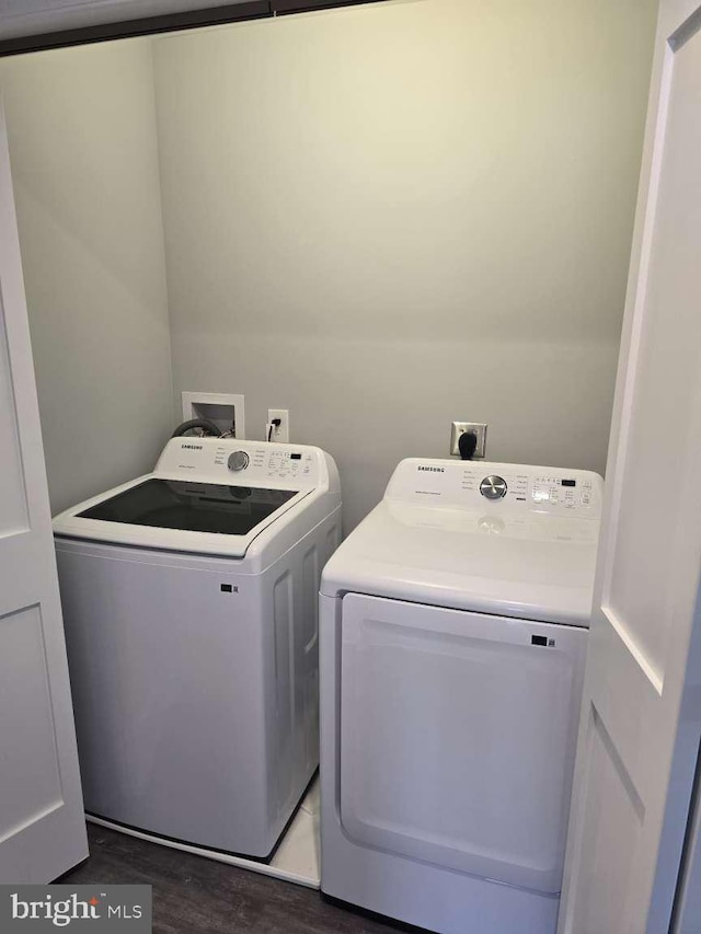 washroom with separate washer and dryer