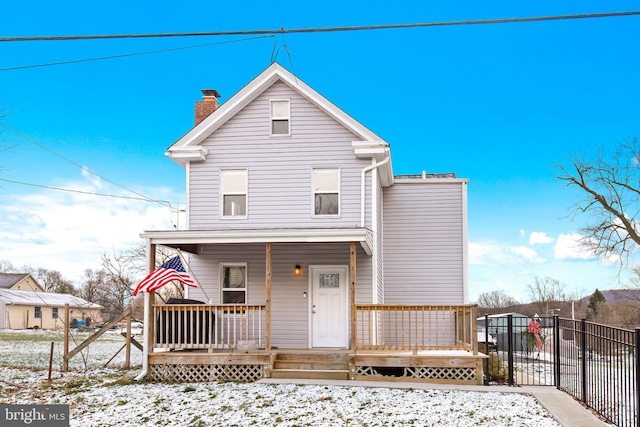 view of property with a porch