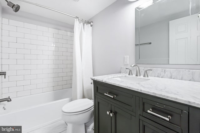 full bathroom with shower / tub combo, vanity, and toilet