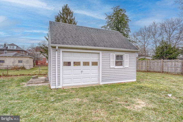 garage with a yard