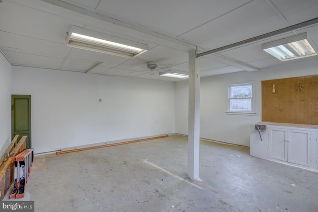 basement with ceiling fan