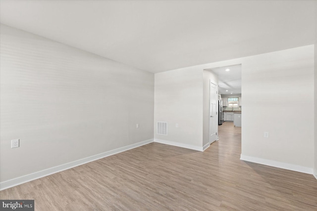 empty room featuring light wood-type flooring