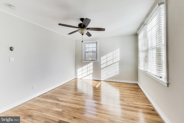 interior space with ceiling fan and light hardwood / wood-style floors