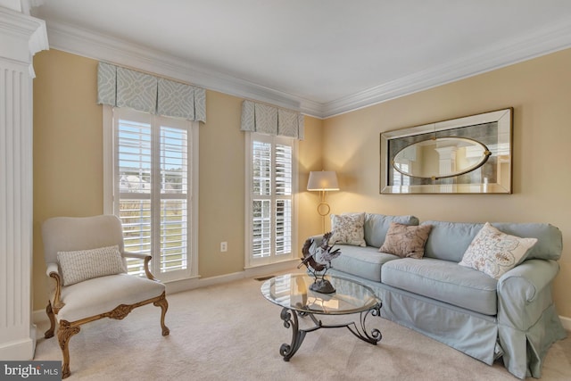 carpeted living area featuring crown molding and baseboards