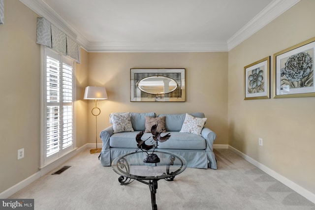 sitting room with crown molding, carpet, visible vents, and a wealth of natural light