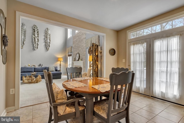 dining room featuring light tile patterned floors