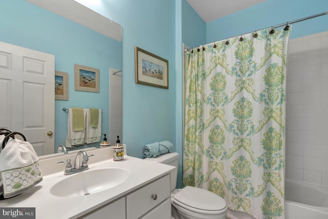 full bathroom featuring vanity, toilet, and shower / bath combo with shower curtain