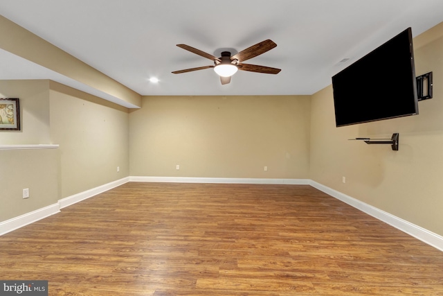 interior space featuring recessed lighting, light wood-style flooring, baseboards, and ceiling fan