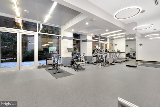 workout area with a wall of windows