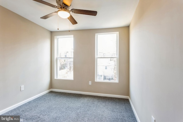 unfurnished room featuring carpet flooring and ceiling fan