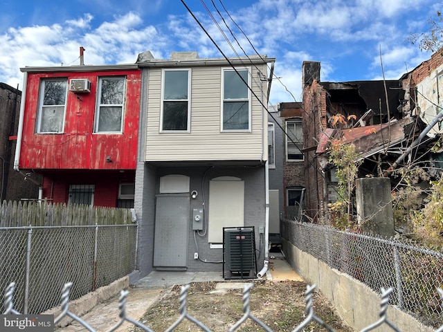 view of front of home featuring central air condition unit