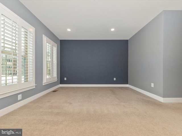 view of carpeted spare room