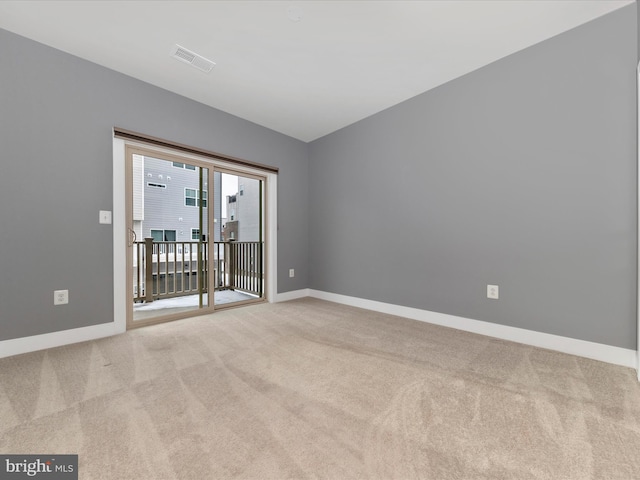 view of carpeted spare room