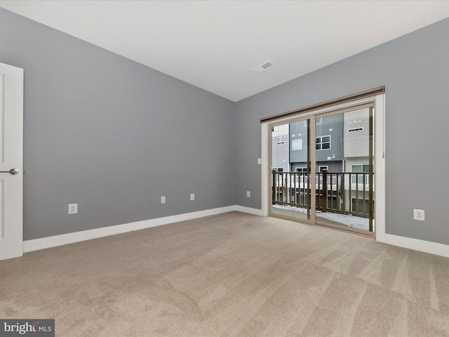 view of carpeted spare room