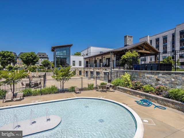 view of pool with a patio