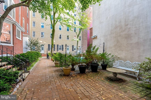 view of home's community featuring a patio