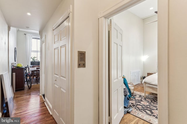 hall featuring wood-type flooring