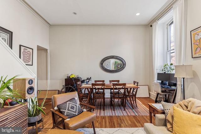 interior space featuring ornamental molding and wood-type flooring