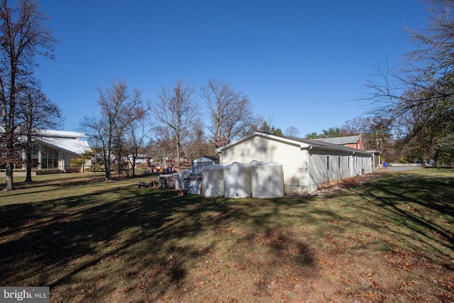 view of home's exterior featuring a yard