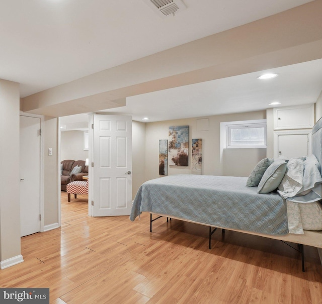 bedroom with light hardwood / wood-style floors