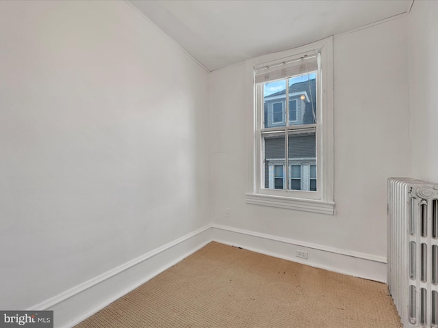 empty room featuring radiator