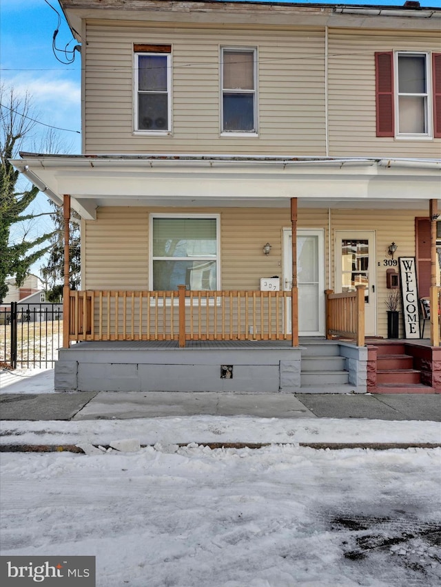 multi unit property featuring covered porch