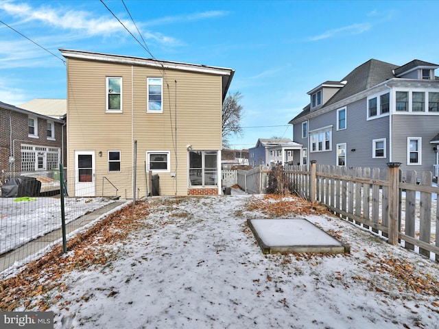 view of snow covered property