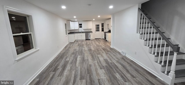 interior space with dark hardwood / wood-style flooring