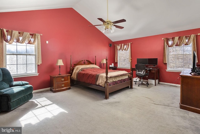 carpeted bedroom featuring vaulted ceiling, baseboards, and ceiling fan