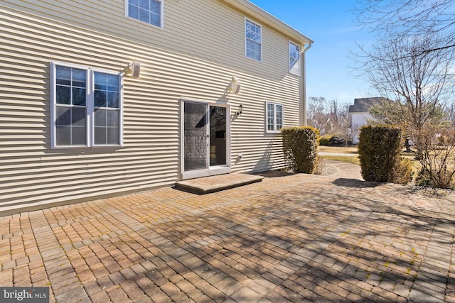 back of house with a patio area