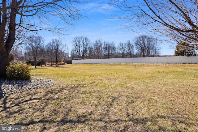 view of yard with fence