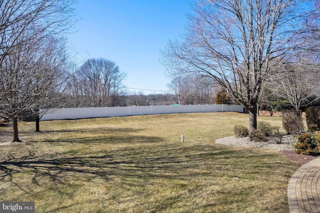 view of yard with fence