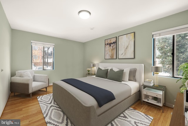 bedroom featuring light wood-type flooring