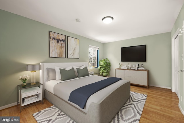 bedroom featuring light hardwood / wood-style floors