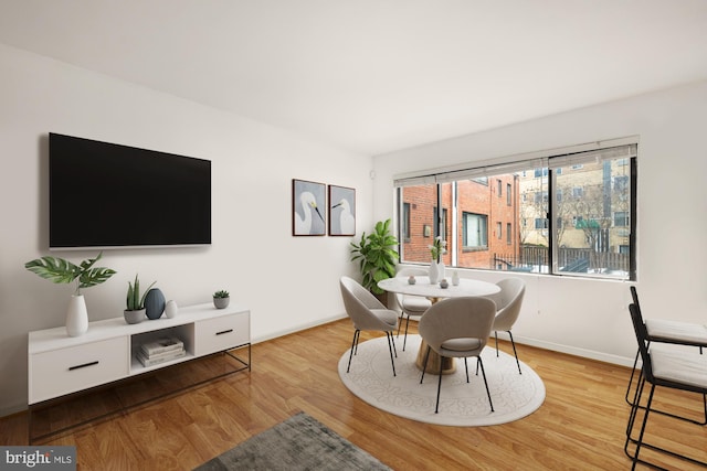 dining room with light wood-type flooring