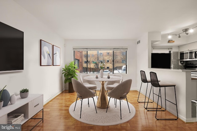 dining area featuring light hardwood / wood-style flooring