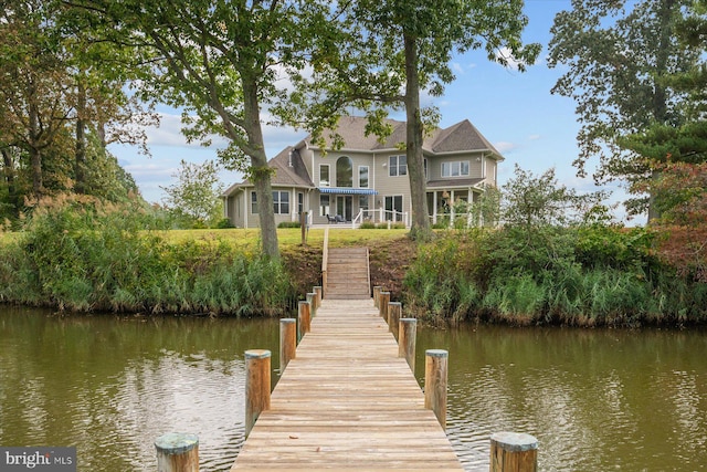 dock area featuring a water view