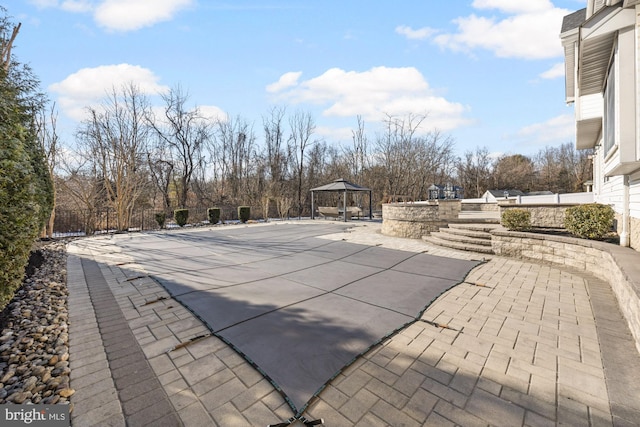 view of pool with a gazebo and a patio