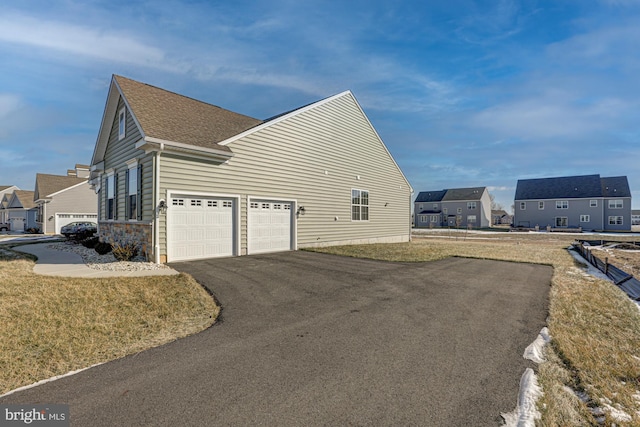 view of home's exterior featuring a yard