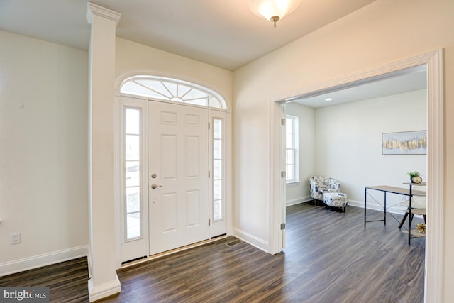 foyer featuring dark hardwood / wood-style floors